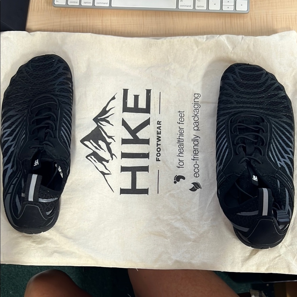 Black Athletic Shoes
Never worn. Original eco friendly packaging included.